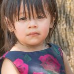 A young tired-looking child